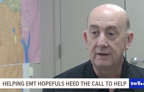 man speaking aobut helping EMTs in AR