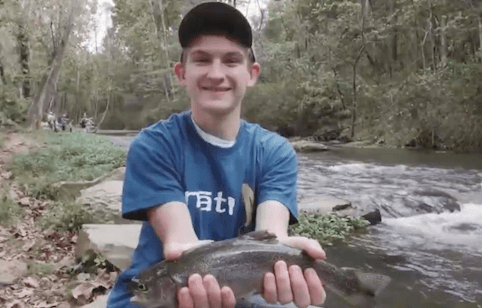 boy with fish - Mayfly Project